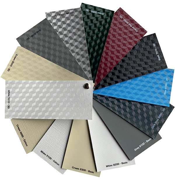 Fan deck of textured PVC roof swatches neutrals to deep red, forest green, and sky blue displaying Pergoflat fabric range.