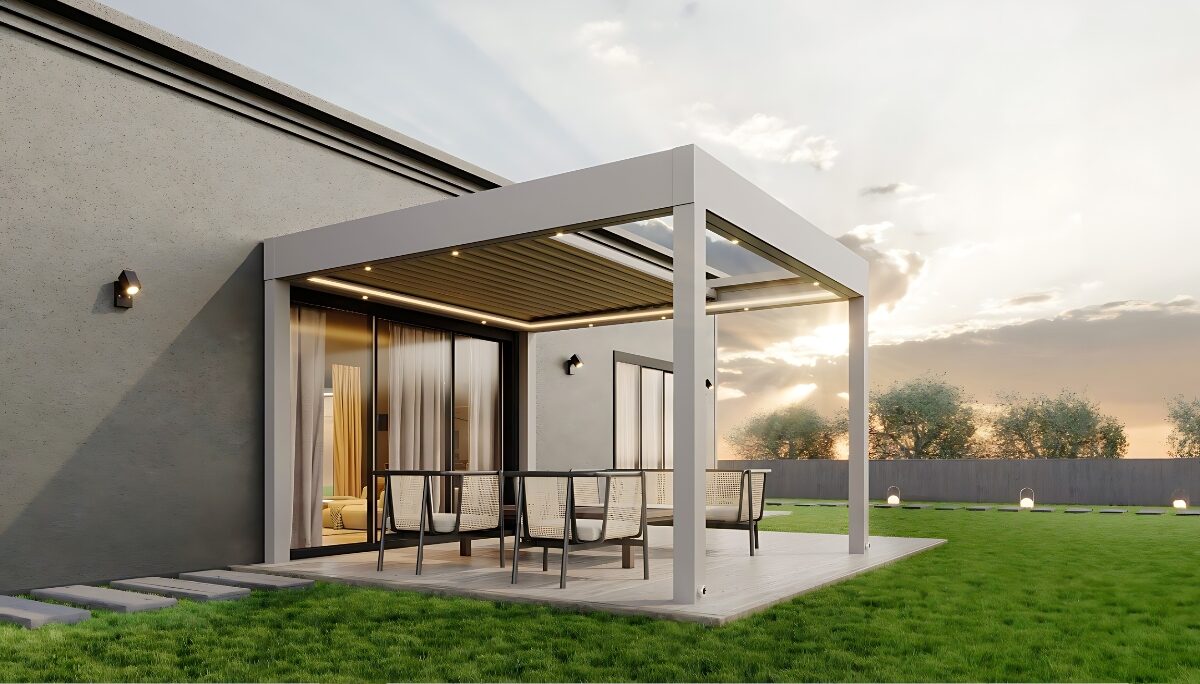 Pergoflat flat-roof pergola with retractable PVC slats and subtle LED strip lights creates a sheltered sunset patio retreat.